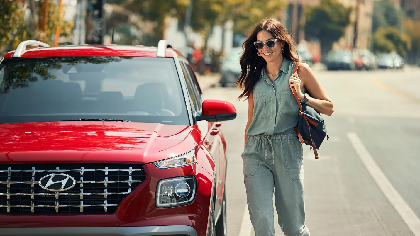 2026 Hyundai Venue with Owner standing beside